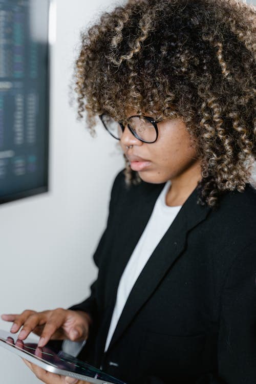 A checklist and financial documents with a heloc calculator, representing HELOC eligibility requirements.